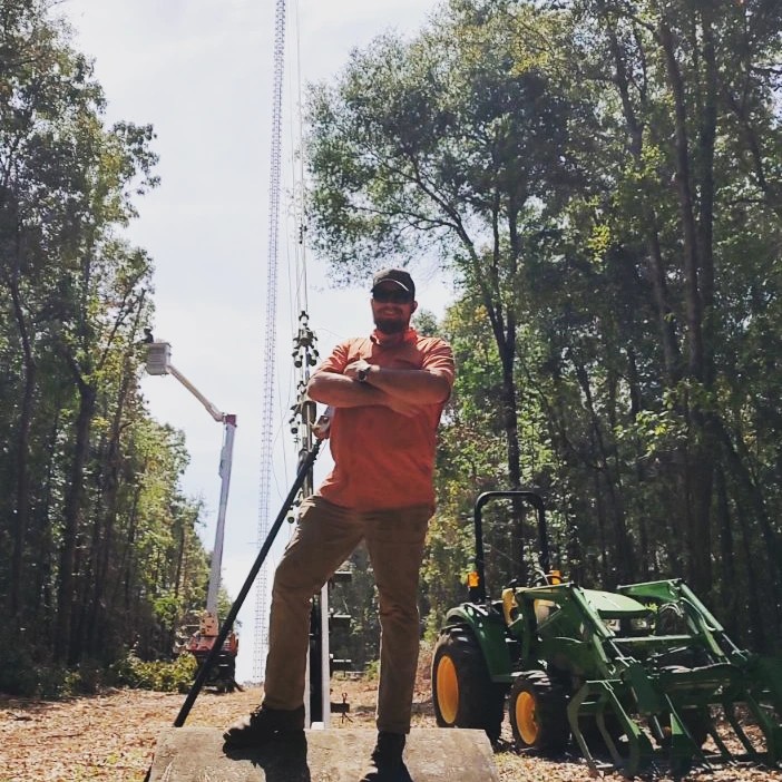 JoWi, the owner of JoWi Tree Service, standing proudly in Americus, Sumter County