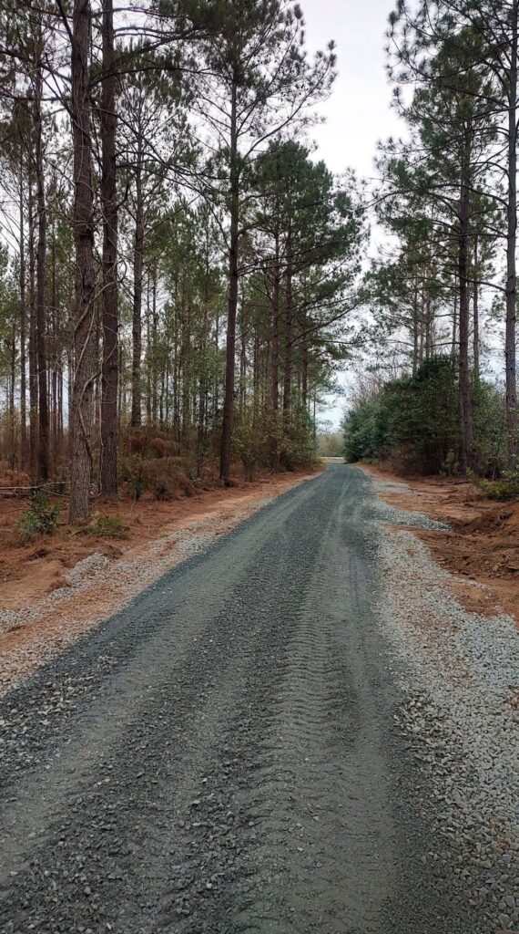 Beautifully graded gravel driveway after professional installation by JoWi Tree Service